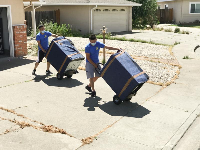 professional movers loading a truck