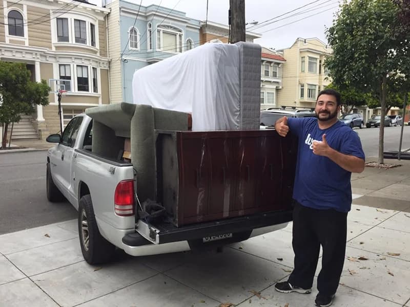Lugger with a loaded pickup truck